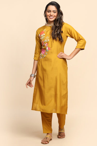 Beautiful mustard color floral motif embroidered suit