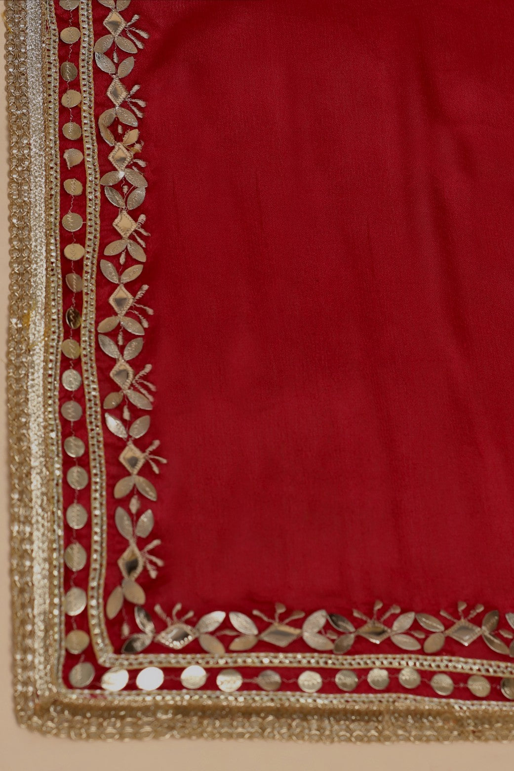details of the heavy red dupatta