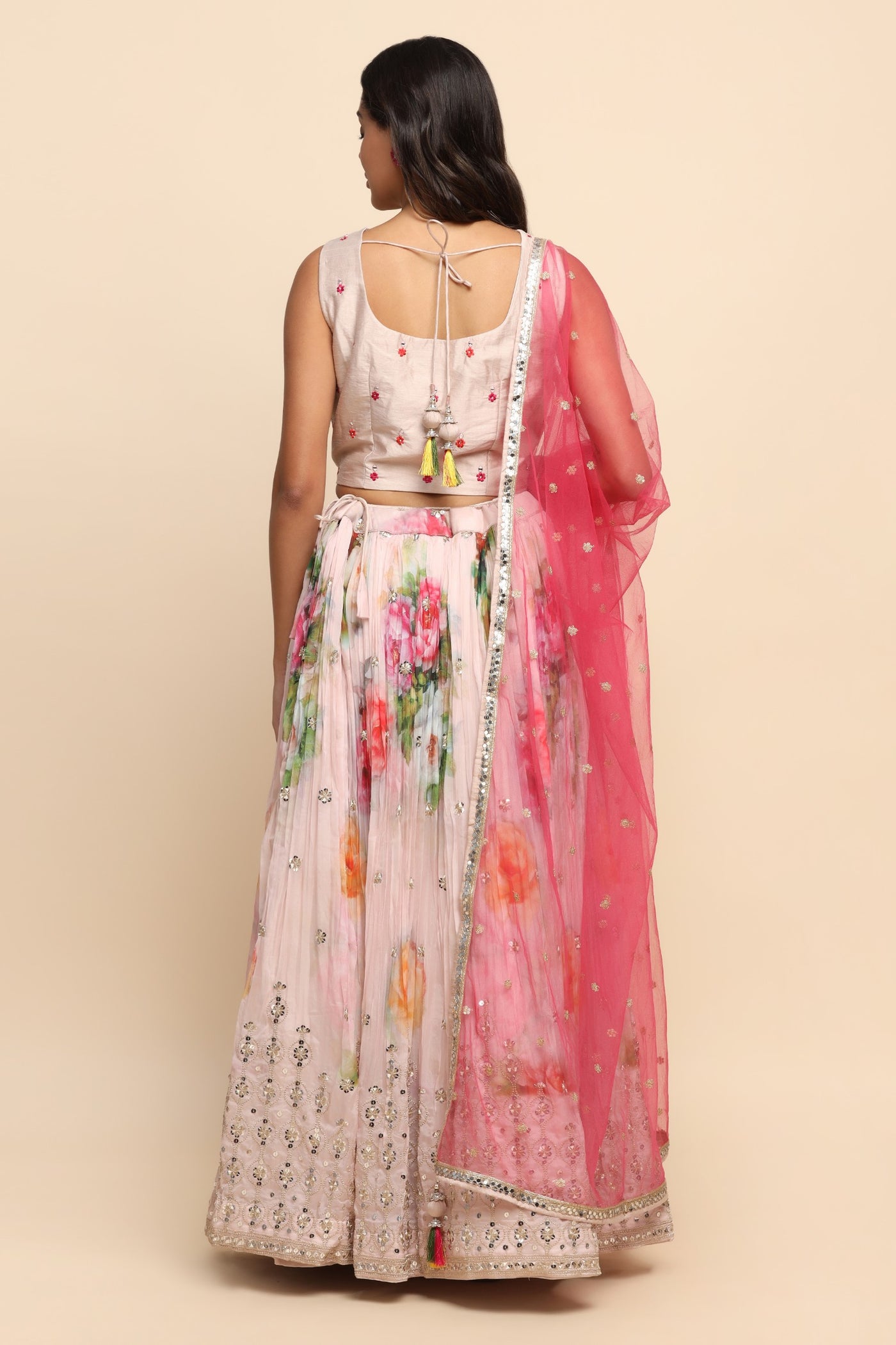 Girl Wearing A Light Pink Color Floral Printed and Embroidered Lehenga Set