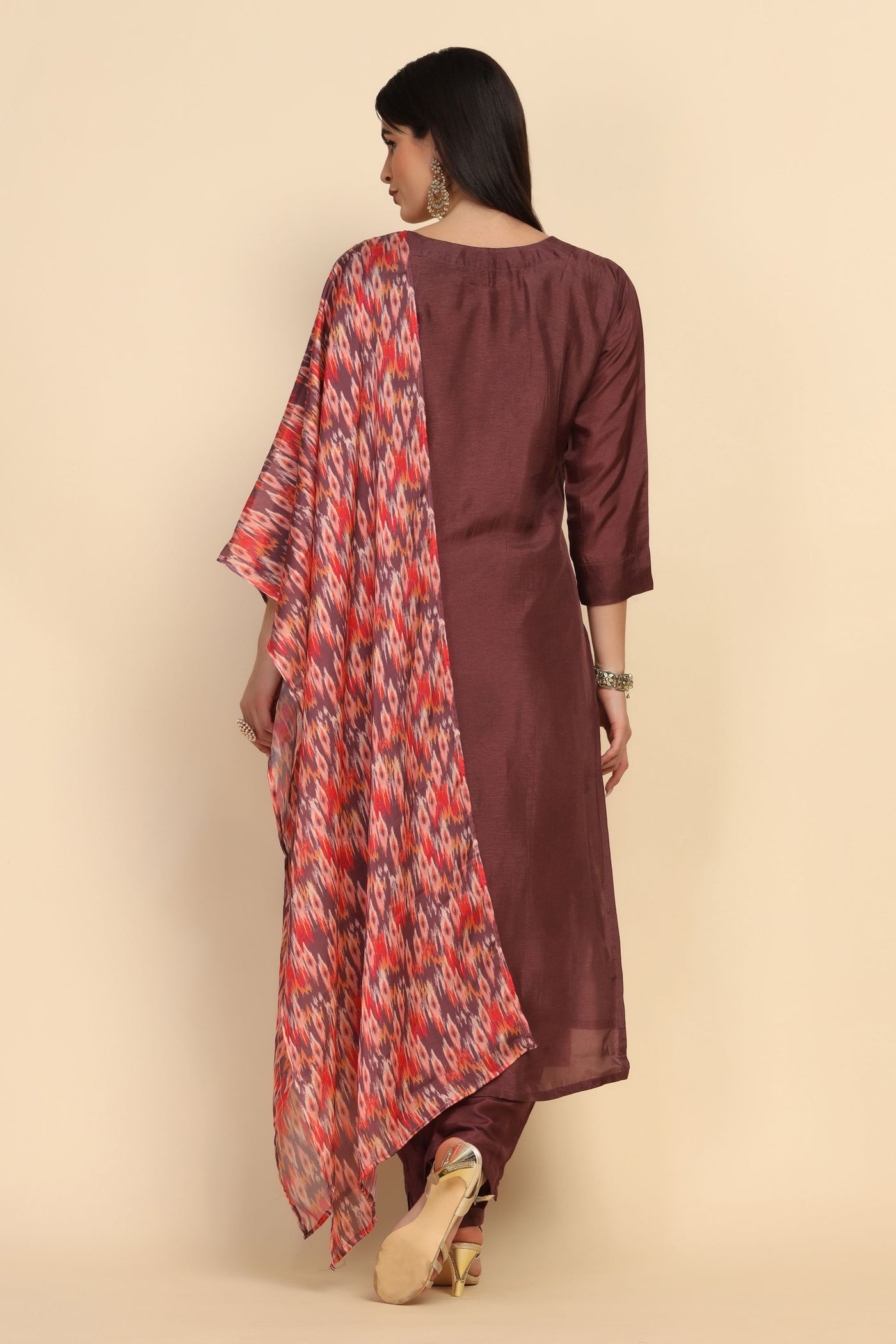girl wearing Cinnamon Color Floral Motif Embroidered Suit with dupatta 