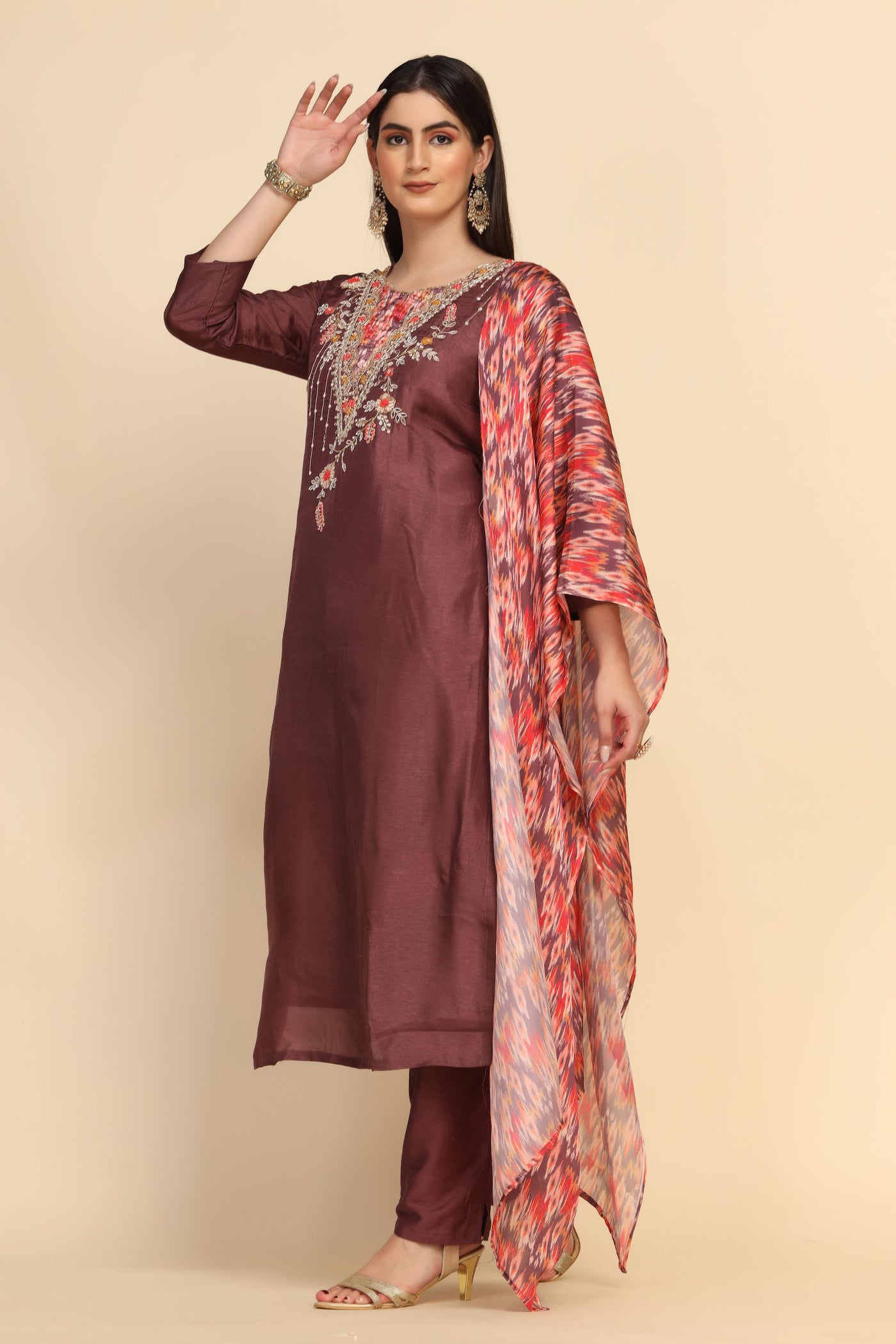 girl wearing Cinnamon Color Floral Motif Embroidered Suit