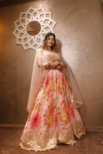 complete look of pink floral lehenga by odhni