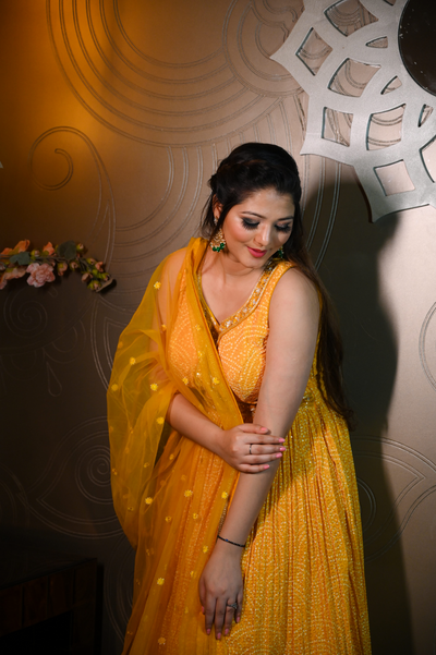 closer look of yellow bandhej dress