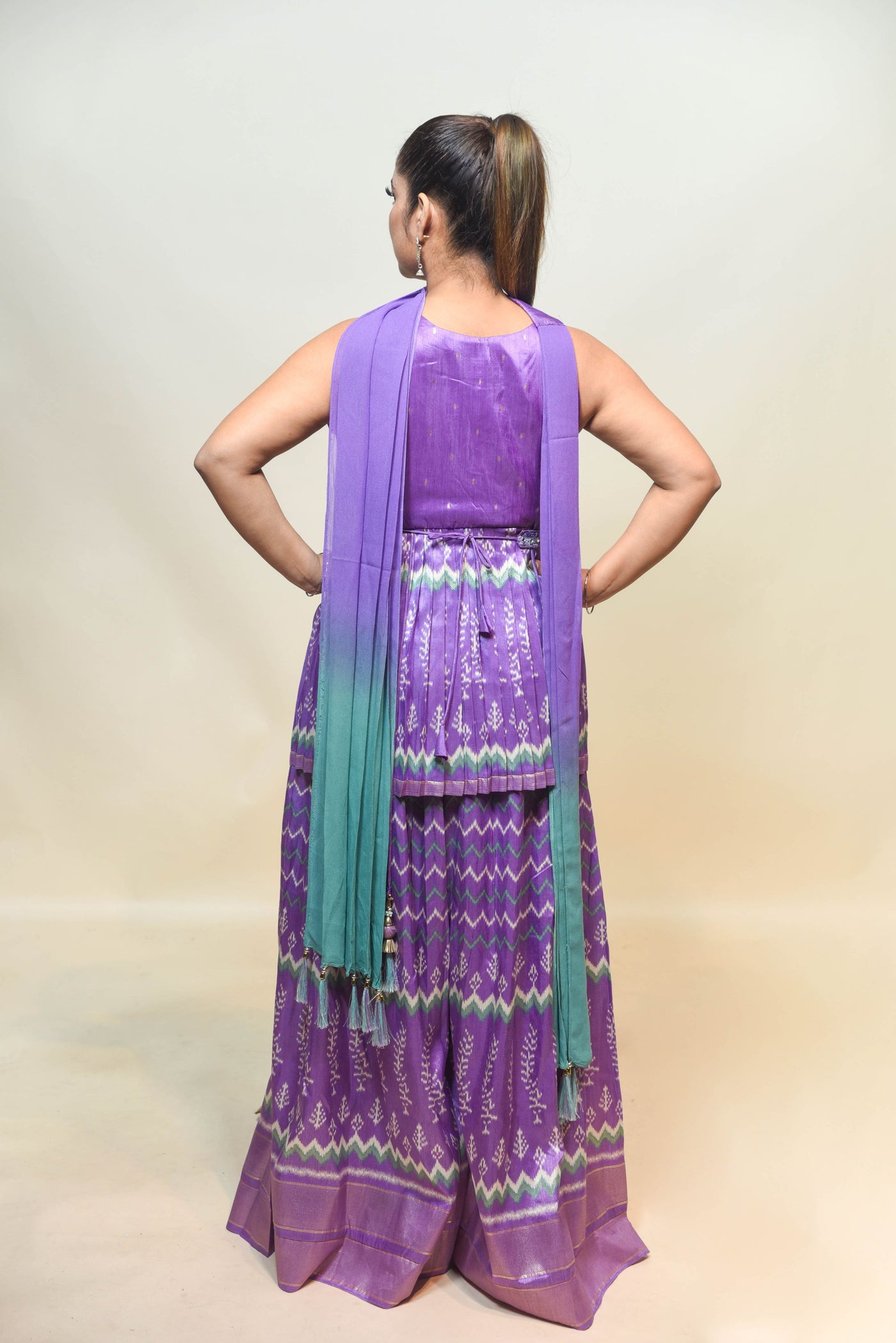 stylish purple color geometrical motif peplum top & sharara set