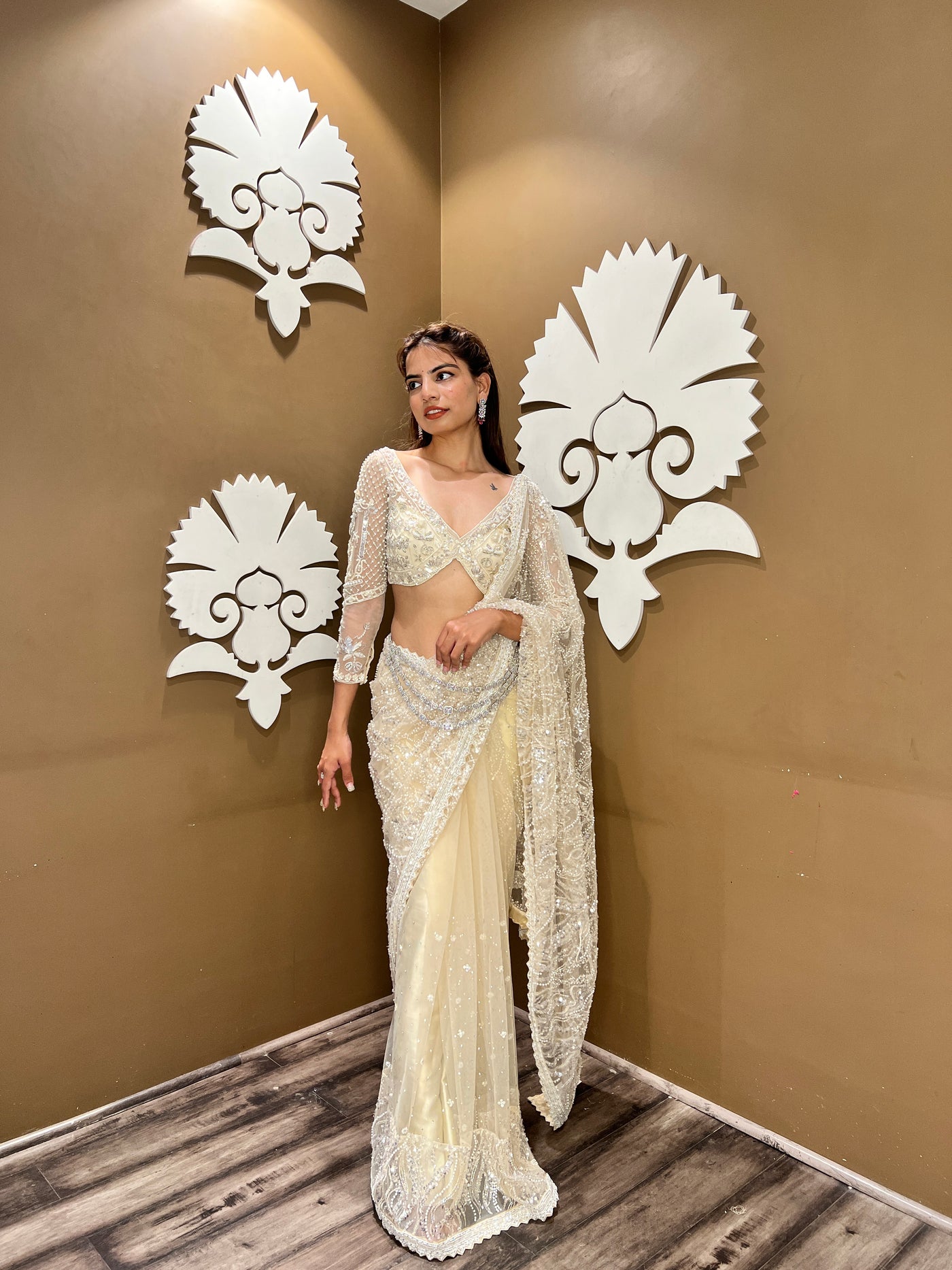 classy beige color floral motif embroidered saree